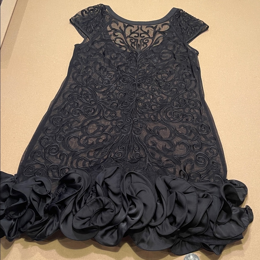 Elegant Black cocktail dress with embellished satin hem, size 8
